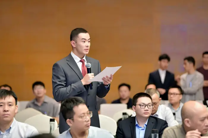 Asking a question during the Q&A session of an academic conference