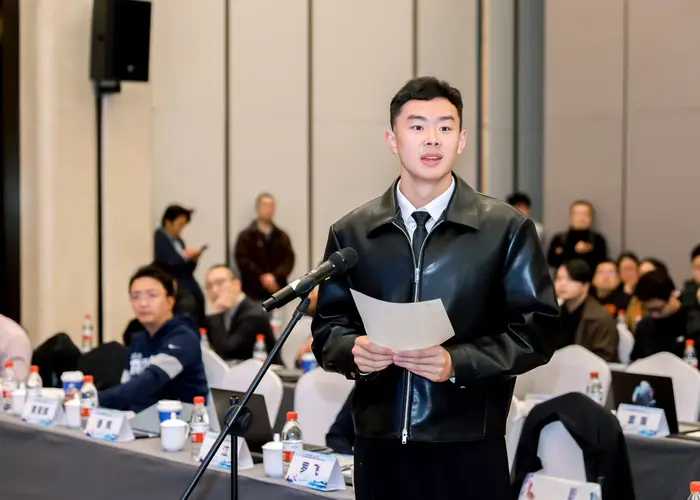 Asking a question during the Q&A session of an academic conference